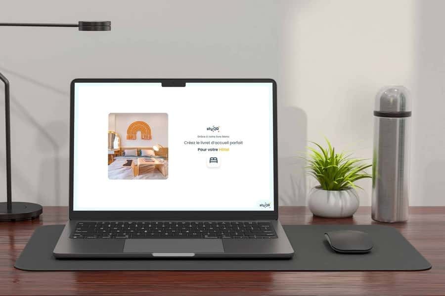 Das StyQR Whitepaper geöffnet auf einem Laptop